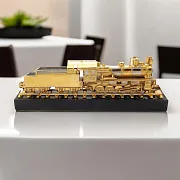 Бронзовый паровоз «Э-7815» на долерите — фотография 1